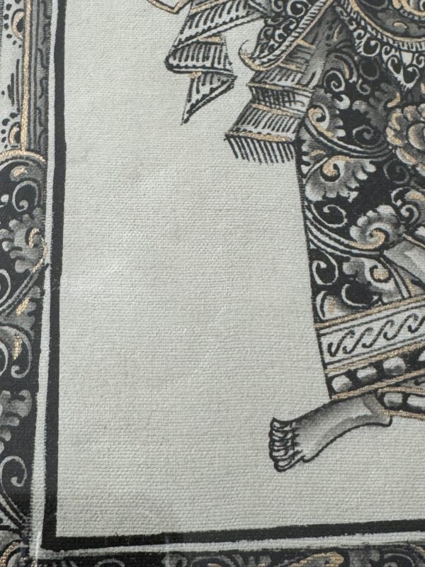 A section of a traditional textile or painting shows intricate black, gold, and white floral patterns. Visible are a foot, flowing robes, and ornate borders, suggesting part of a larger figure or scene rendered in a decorative, stylized manner.